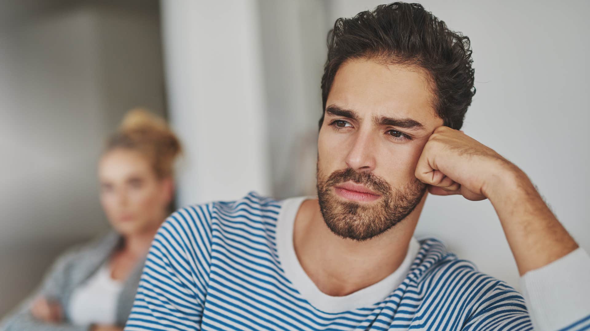 man ignoring red flags from his partner