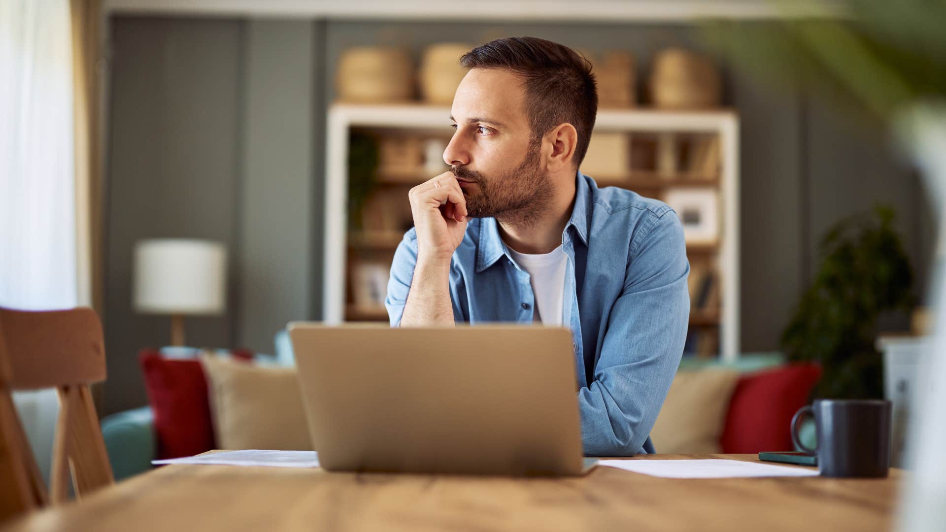 man experiencing identity crisis deep in thought