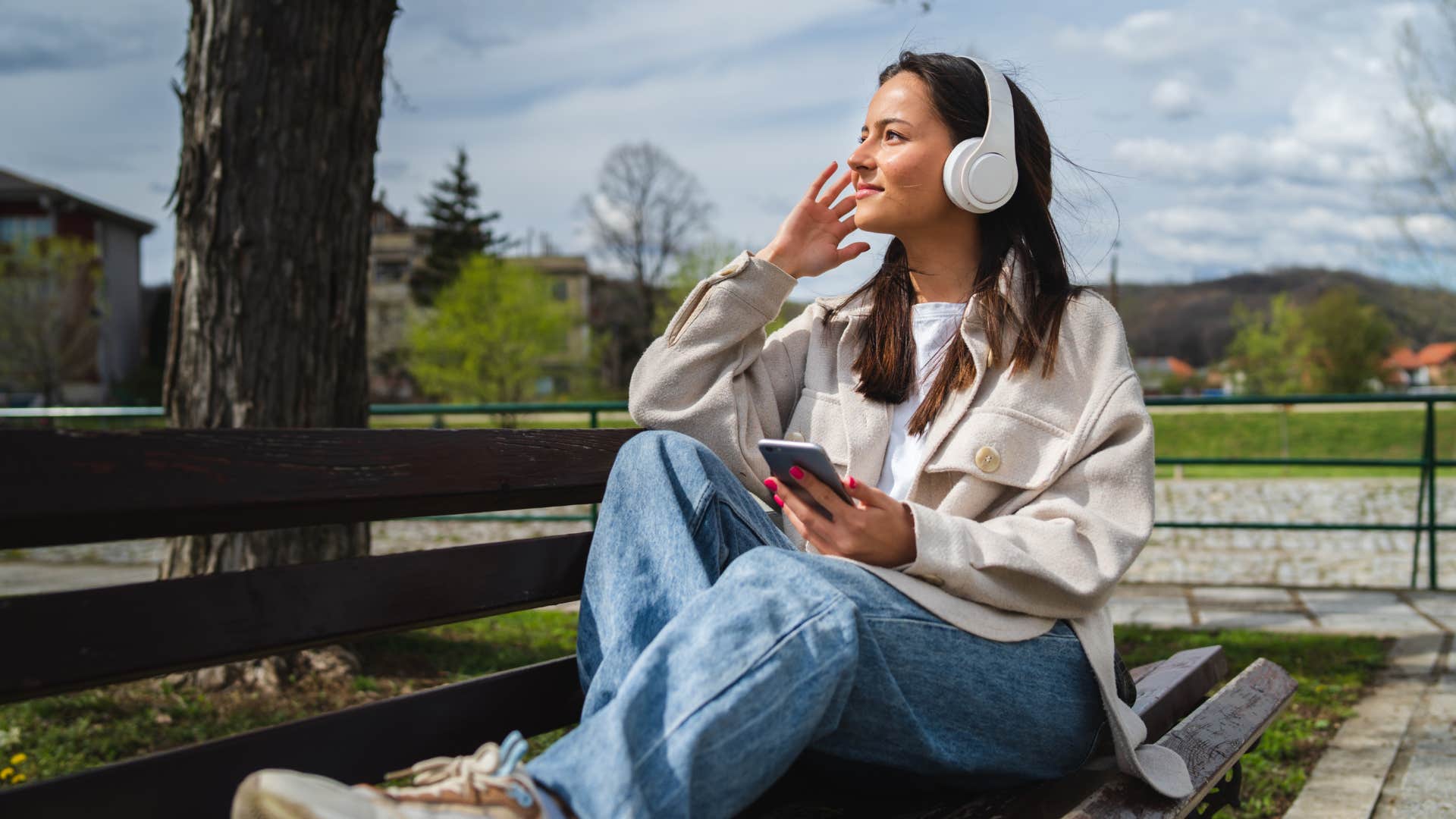 woman ignoring her problems listening to music
