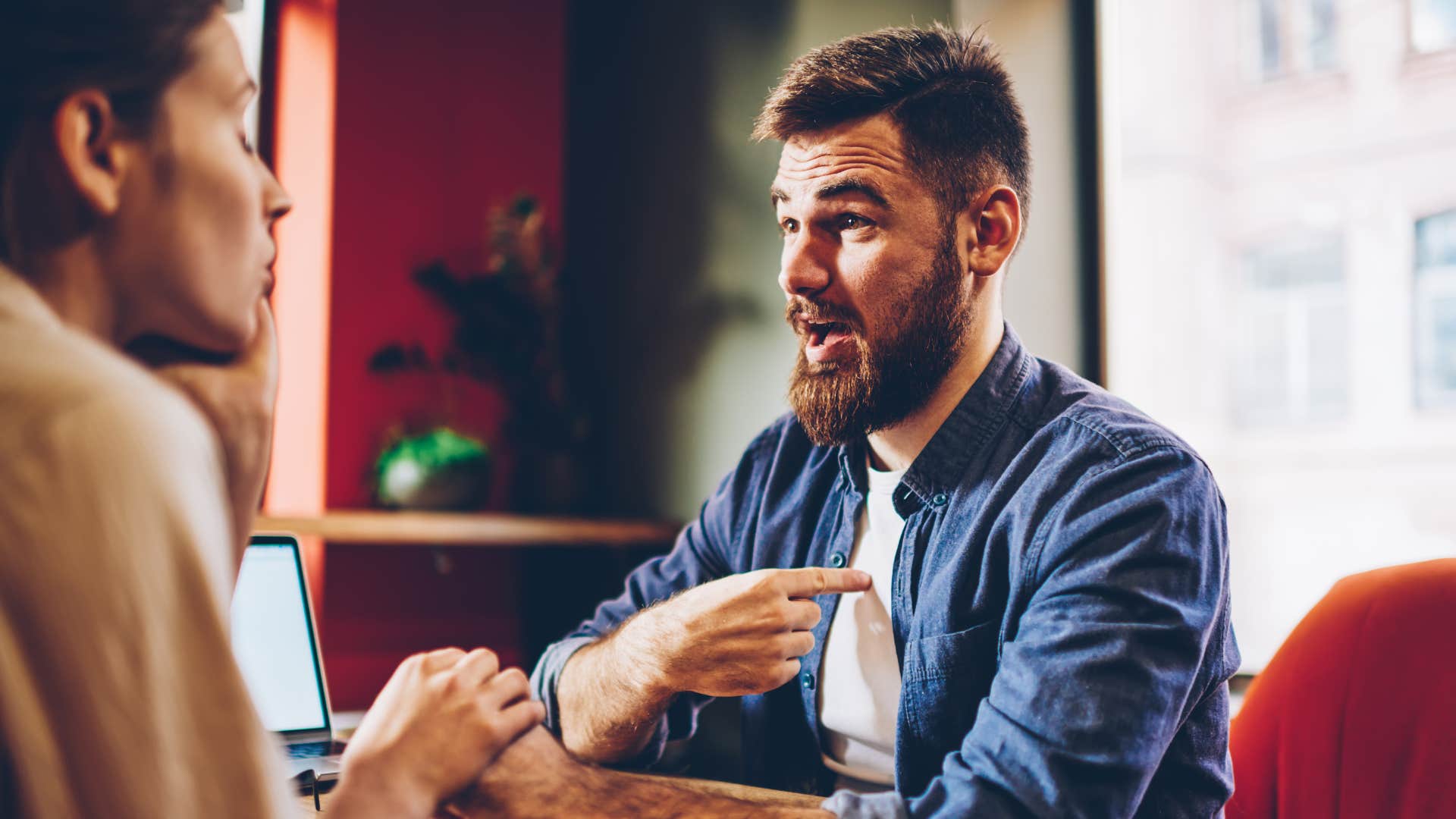 annoyed man feeling pressured to justify his choices to partner