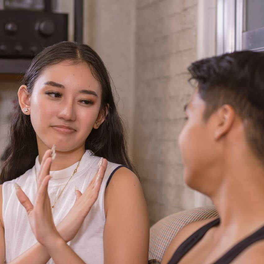 woman who teaches people how to treat her by setting her boundaries