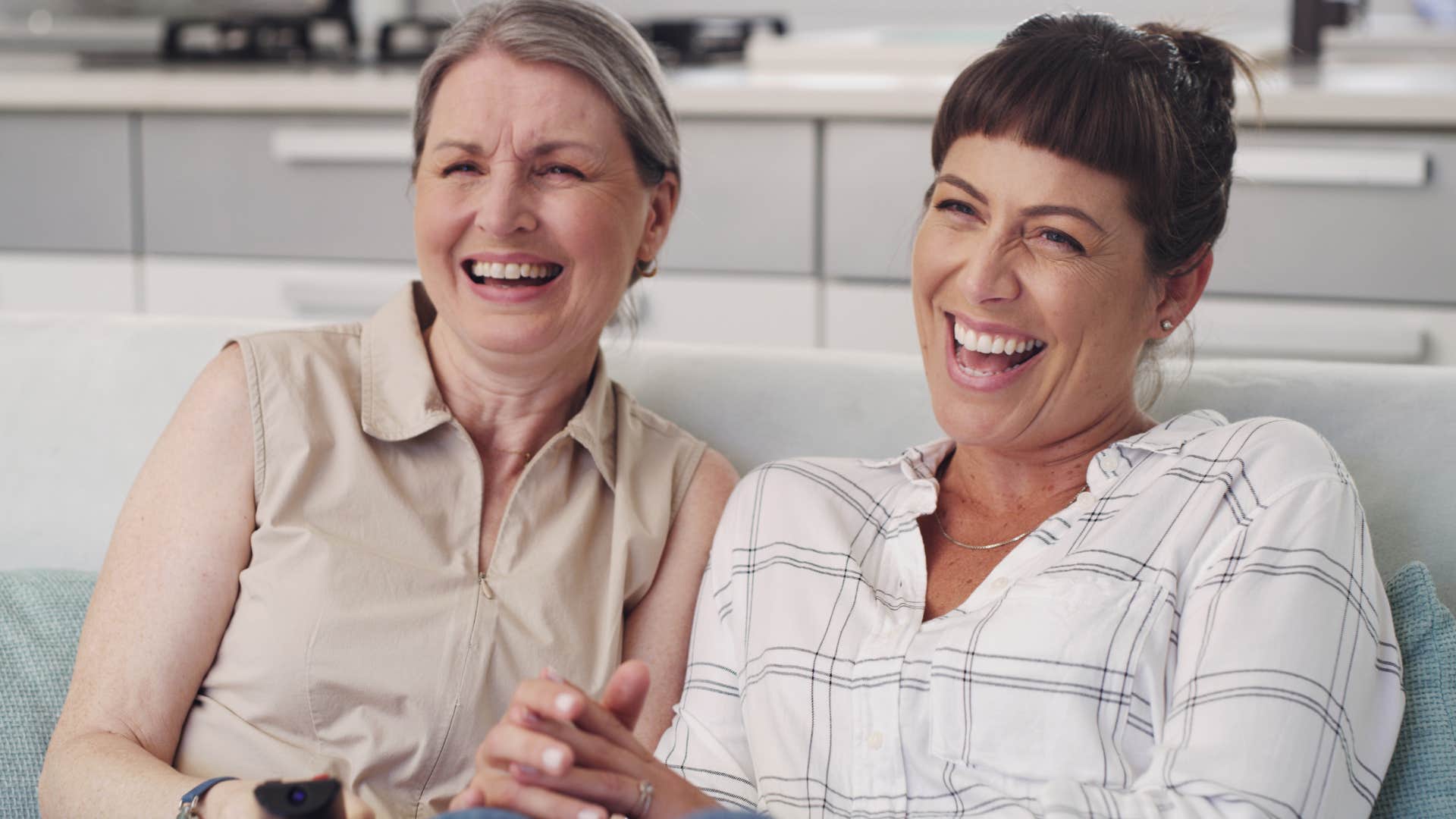 woman whose inner child feels held and loved smiling with partner