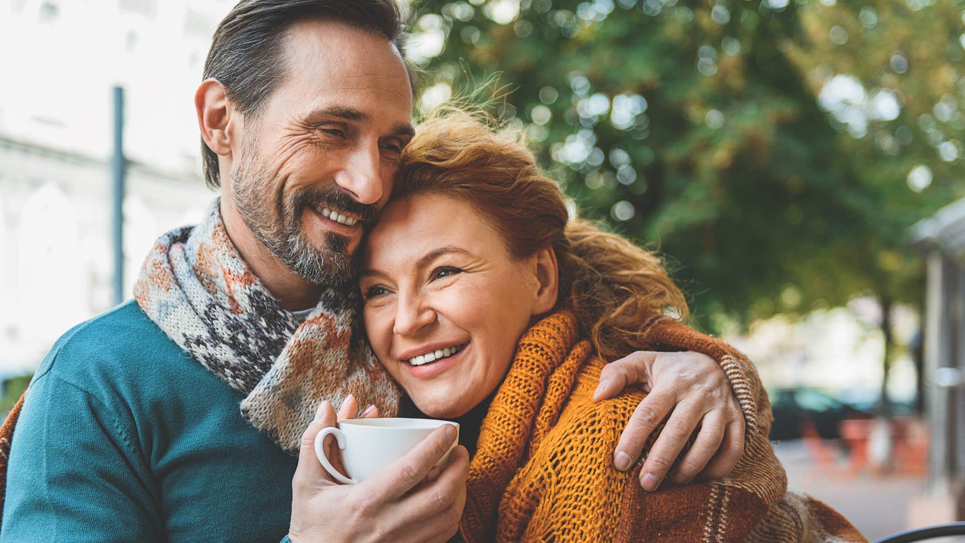 man who loves and supports his wife's loved ones hugging her