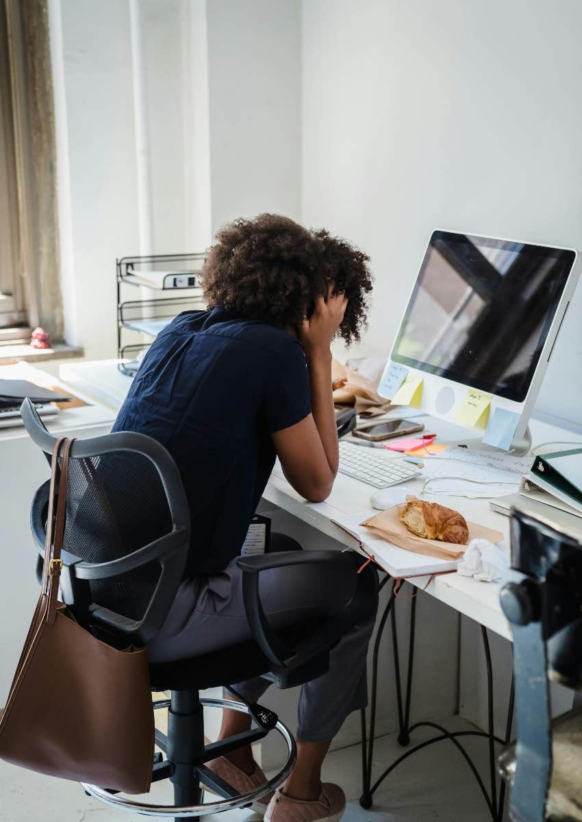 woman stressed at work because of AI
