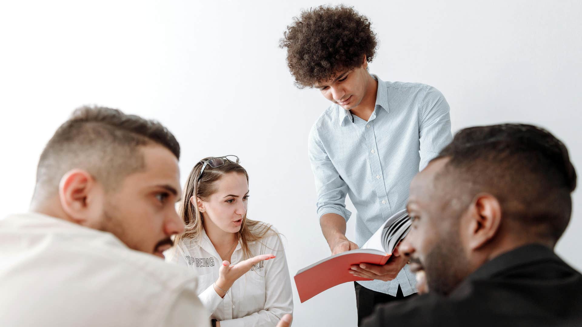 man getting criticism at work