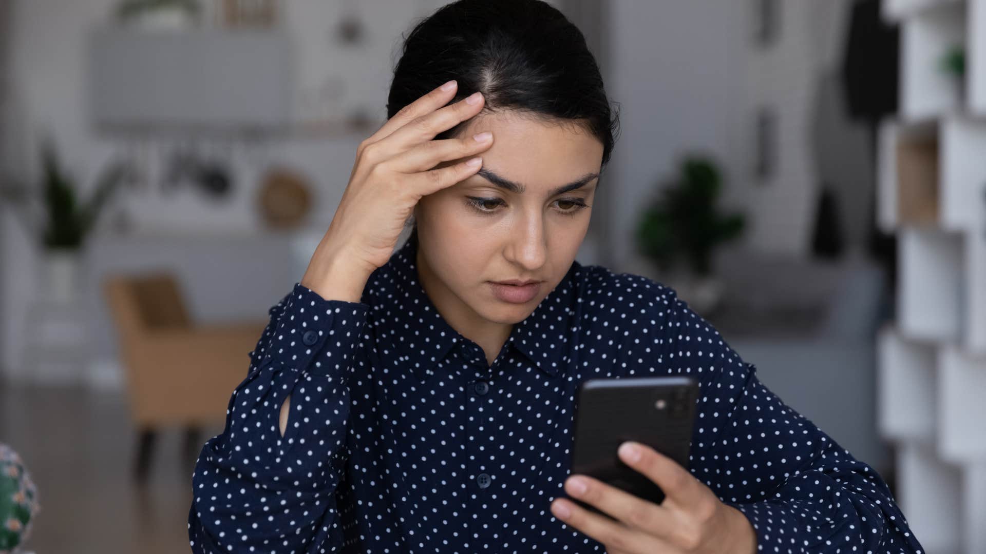 Woman overusing filters on her phone.