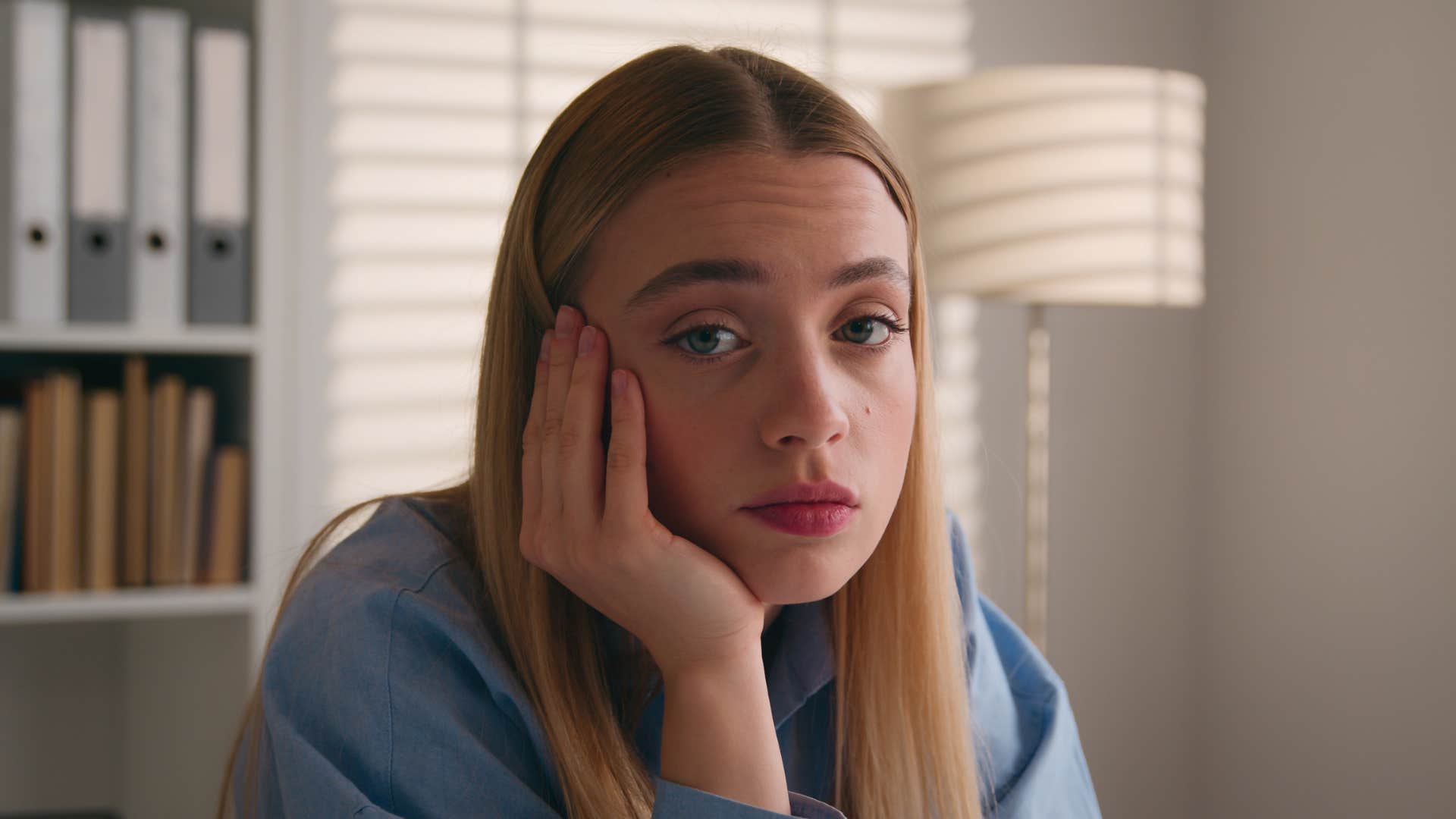 bored woman thinking at home