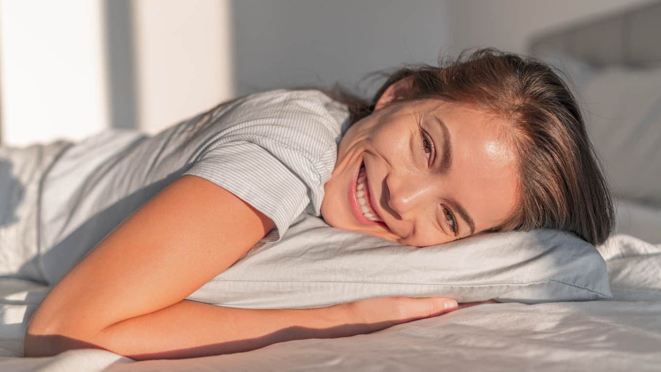happy woman with common sense waking up for her morning routine