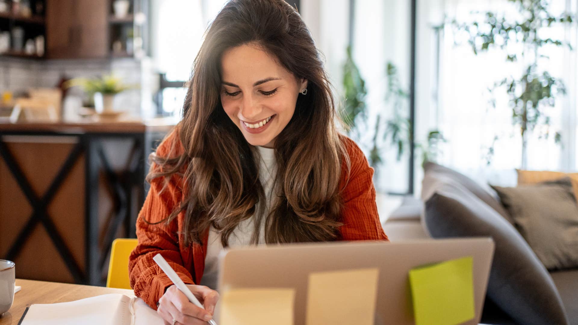 woman with passwords taped to her devices