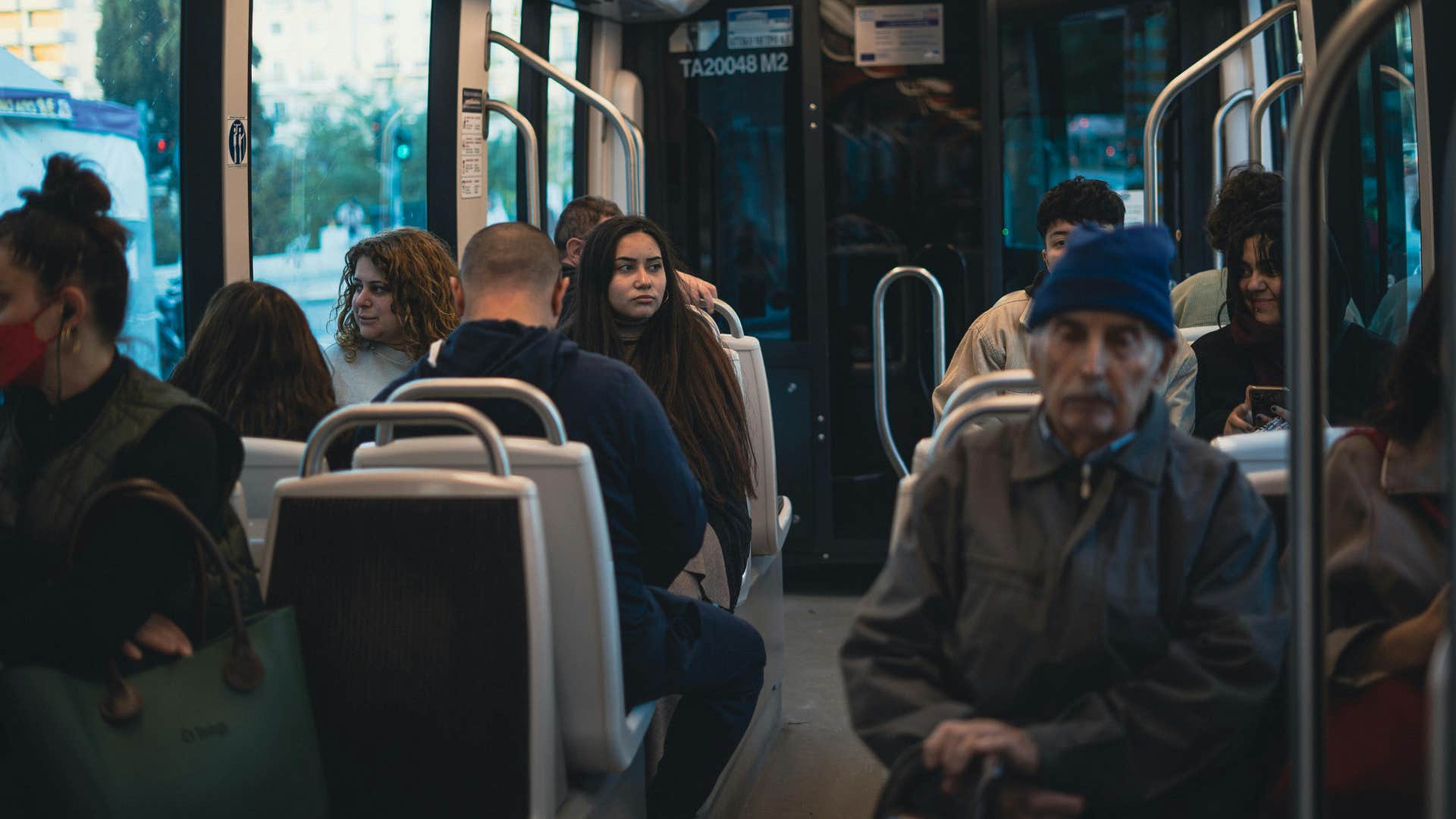 people riding the bus