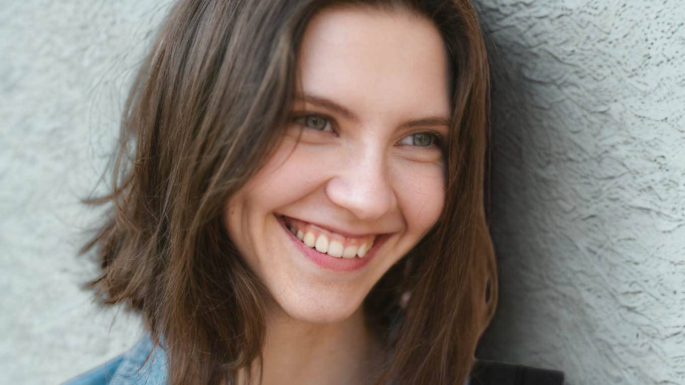 Woman is much happier.