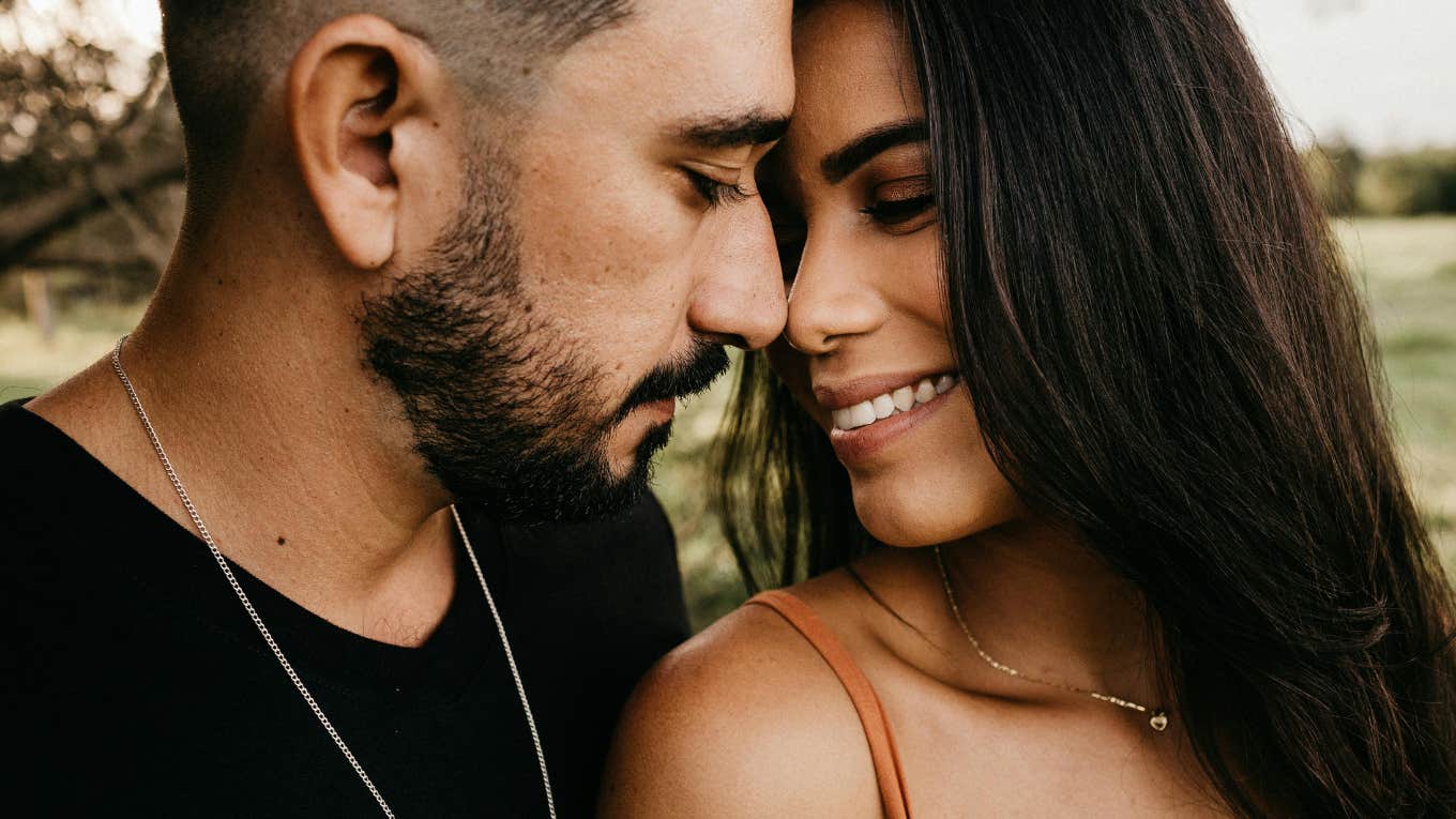 Two people sharing an intimate unspoken moment showing the deep signs that appear when two souls genuinely connect.