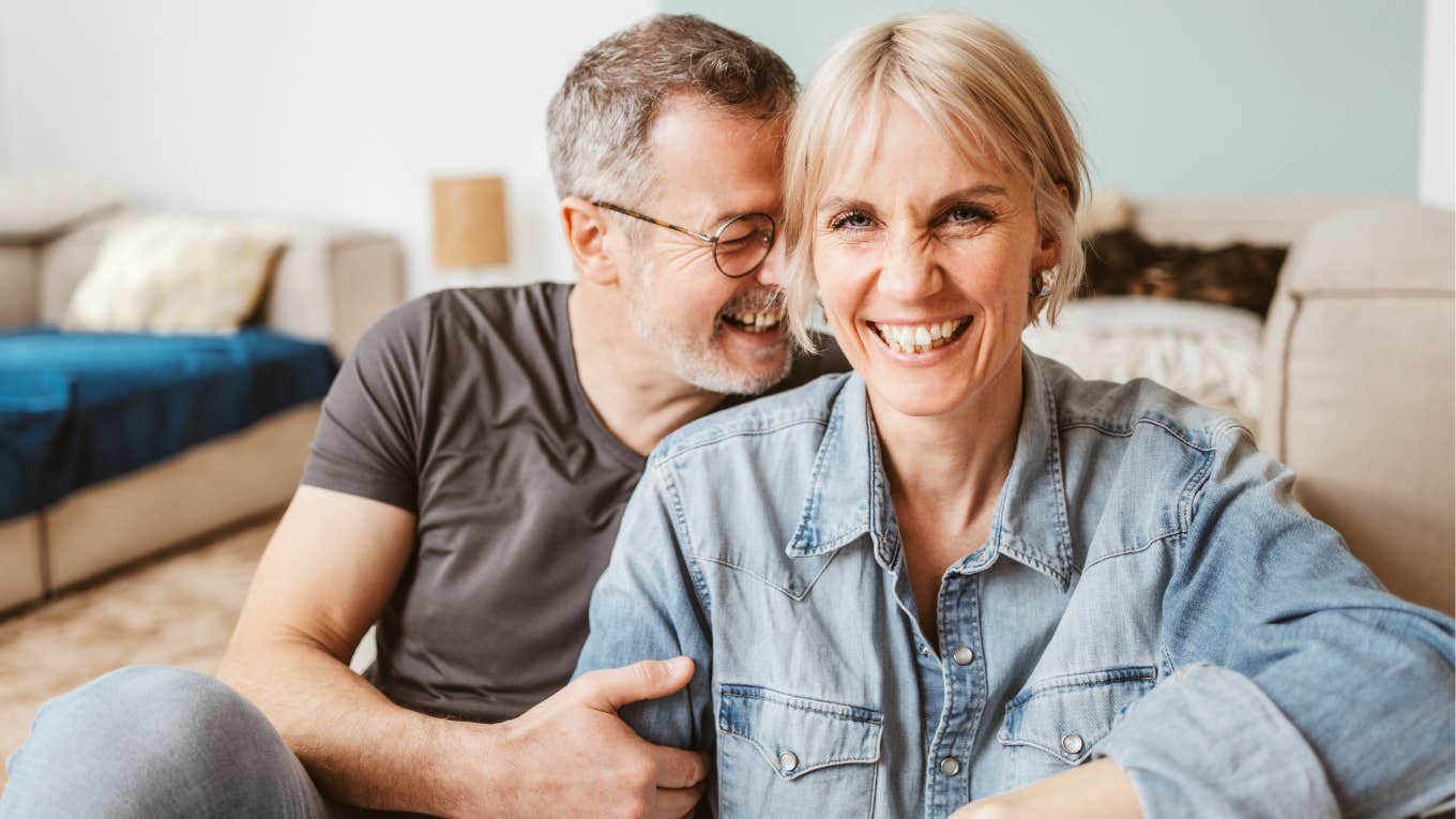 man still obsessed with his wife hugging her