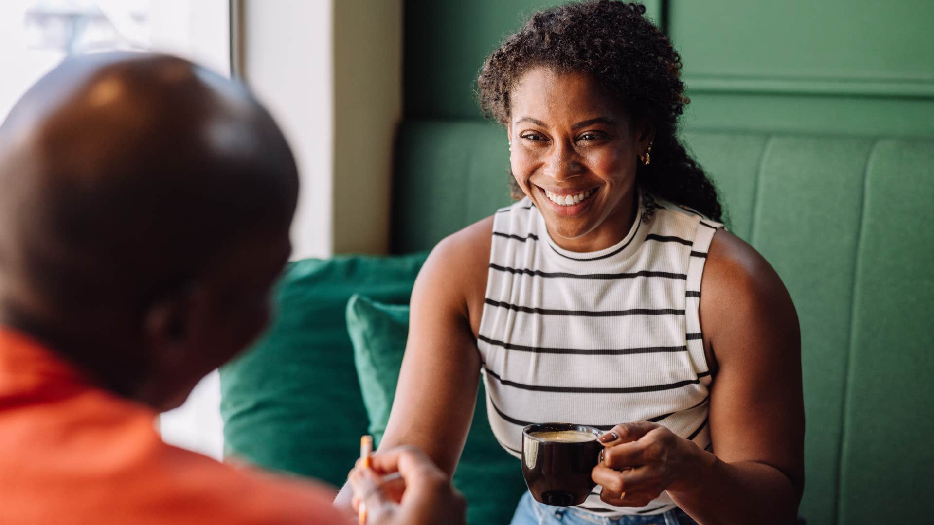endlessly loyal woman smiling with a partner