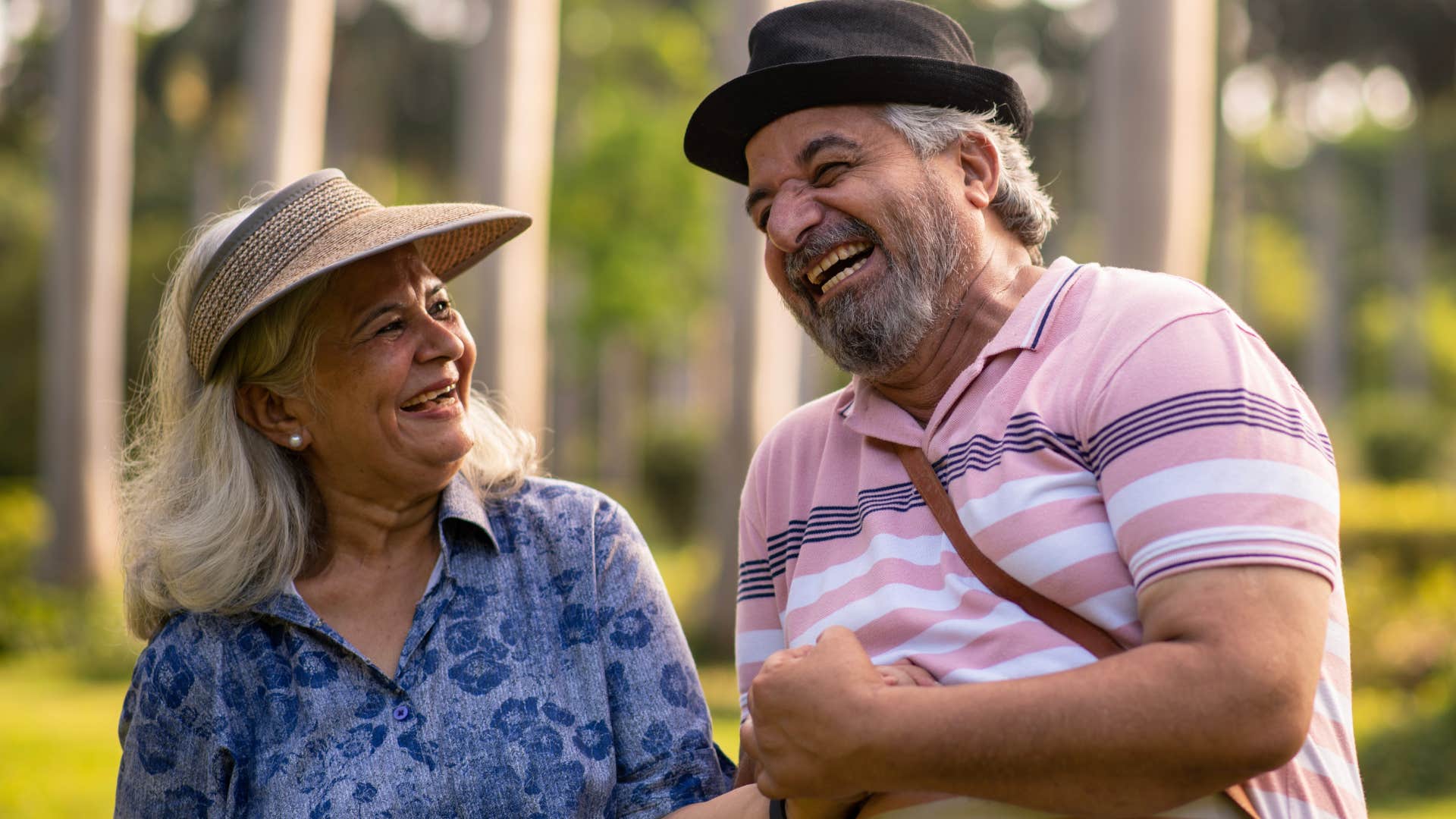 man smiling with a woman who he feels incredibly safe around