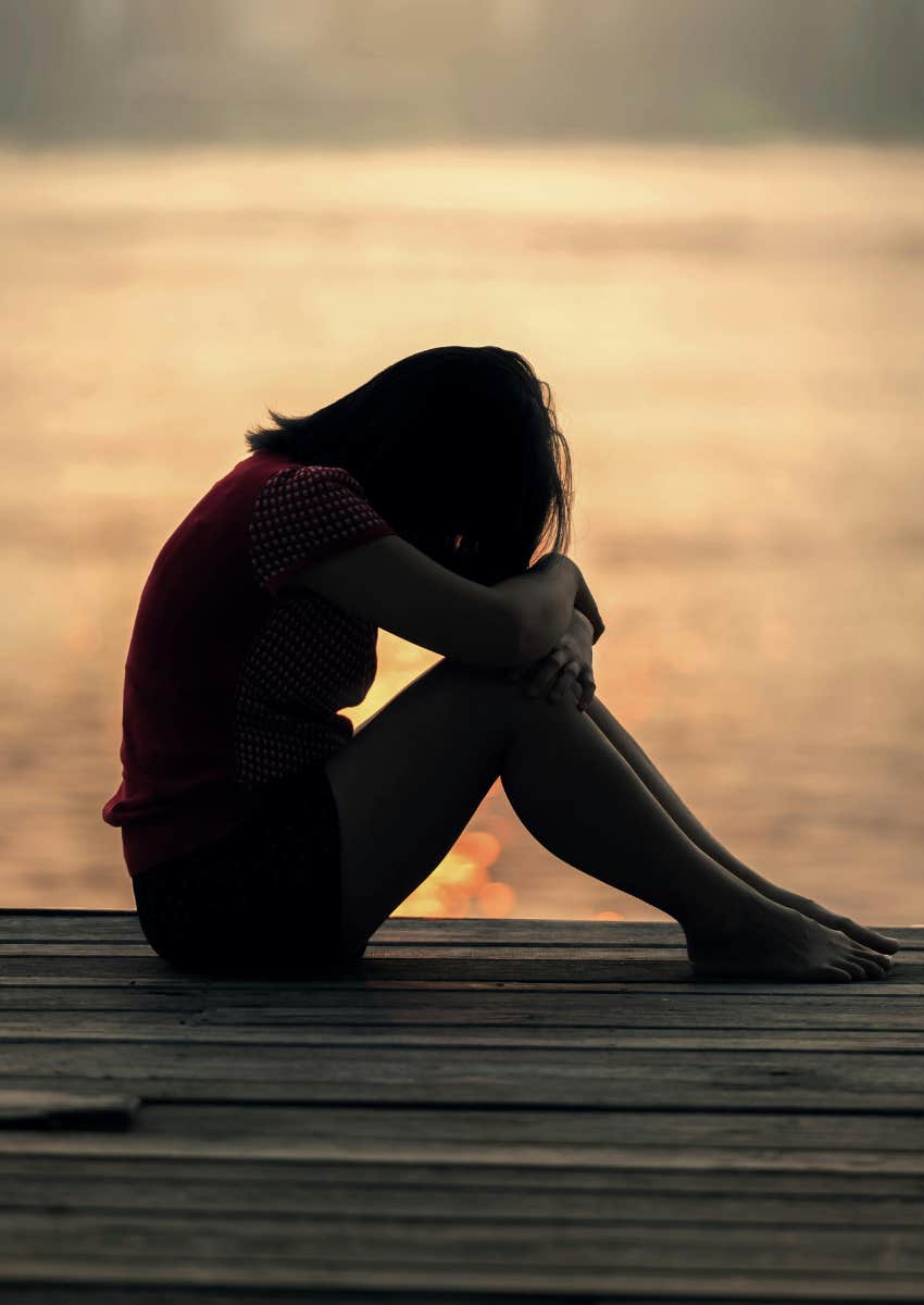 woman who is sad because the white rabbit got her