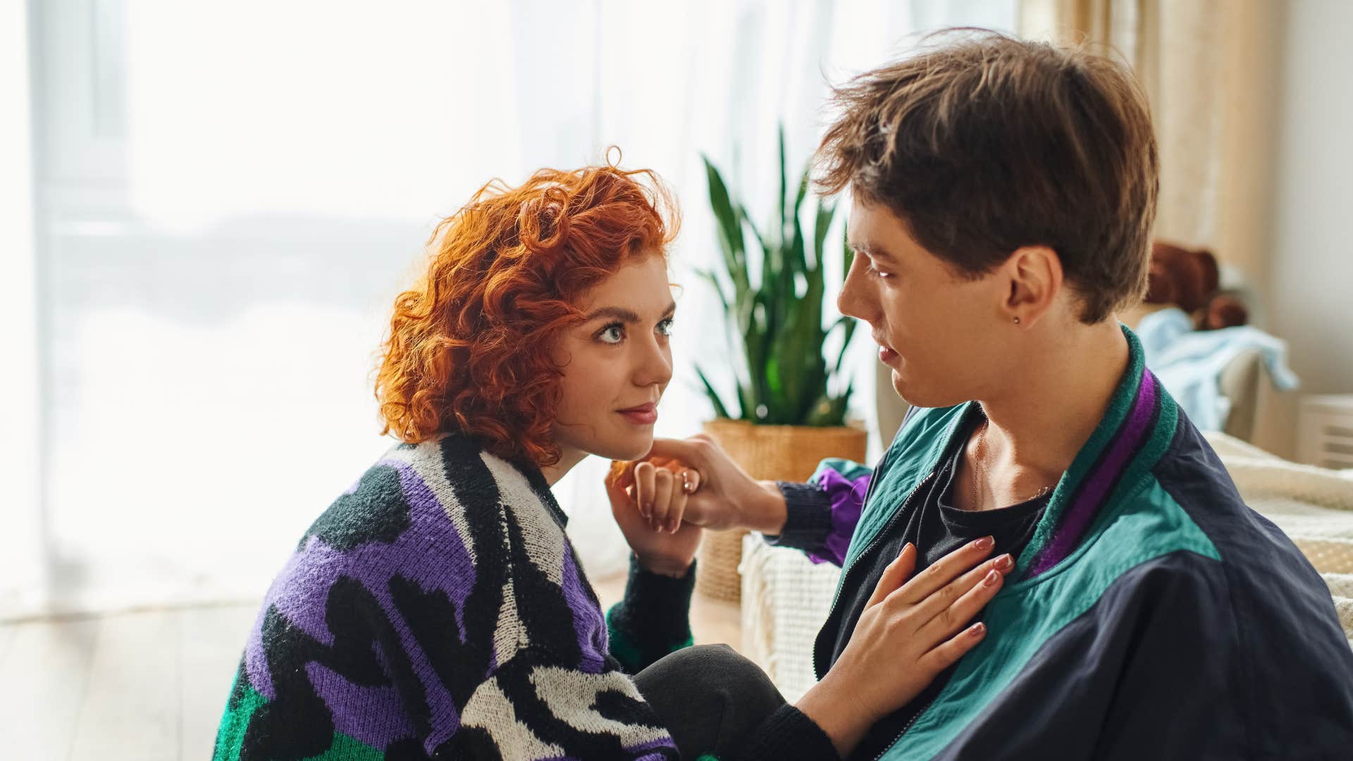 couple looking at each other speaking without saying a word