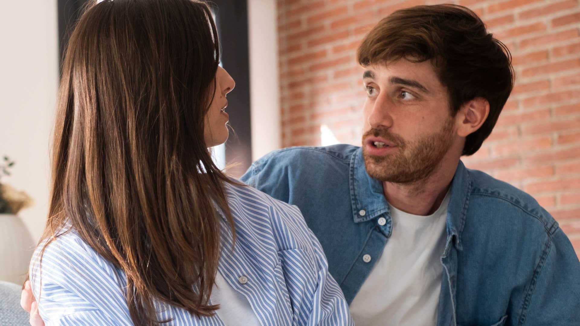 woman who's stopped repeating herself looking at her husband