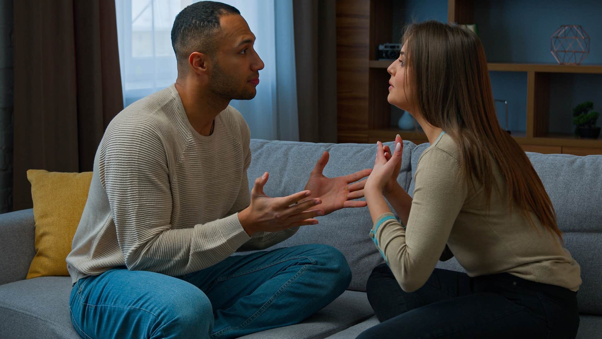 upset woman saying i have too much on my mind to her partner