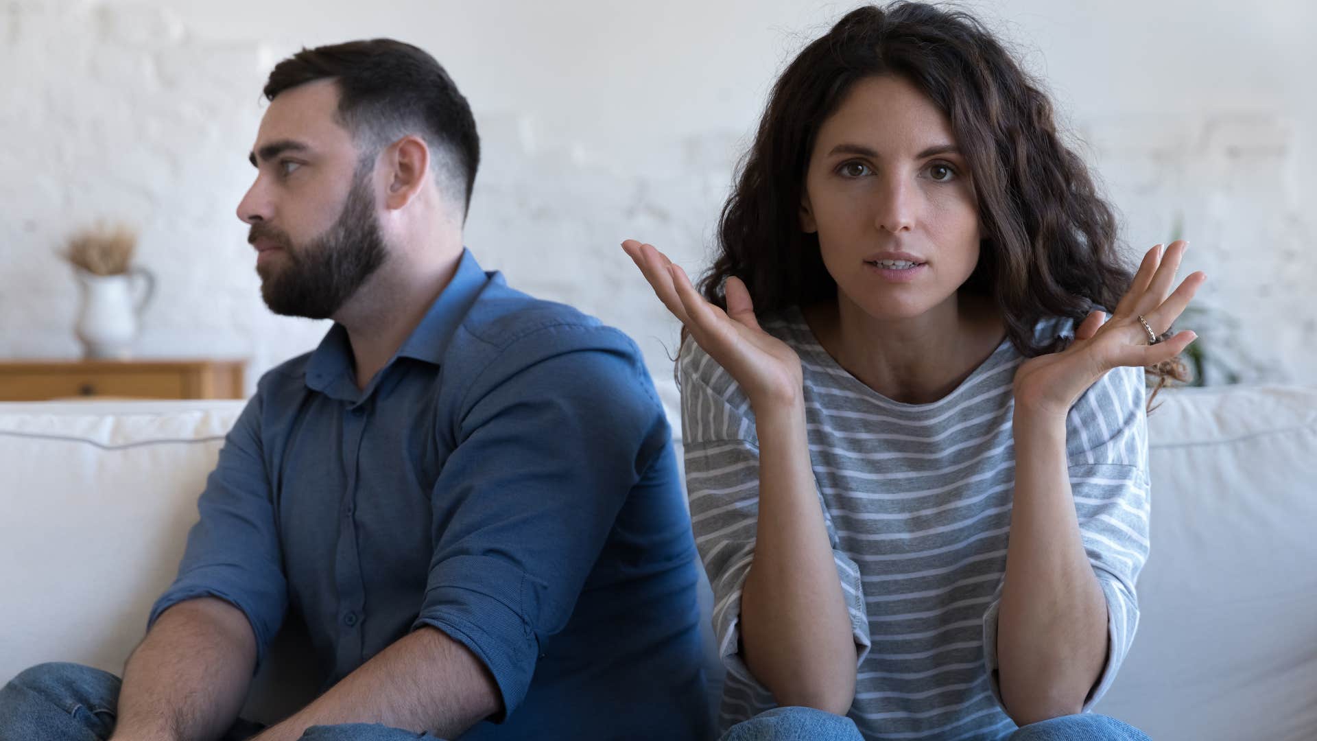 frustrated woman telling partner I'm not talking about this right now