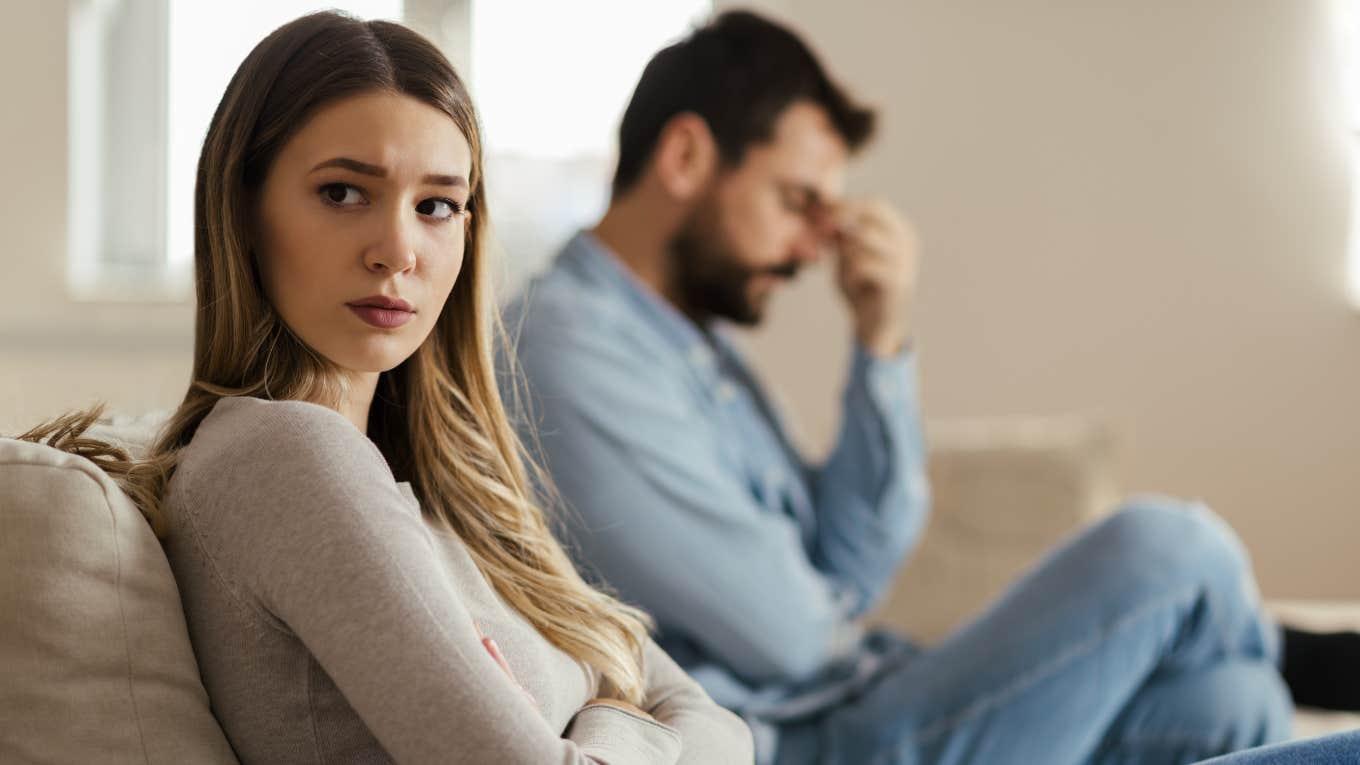 wife avoiding intimacy with her husband turned away ignoring him