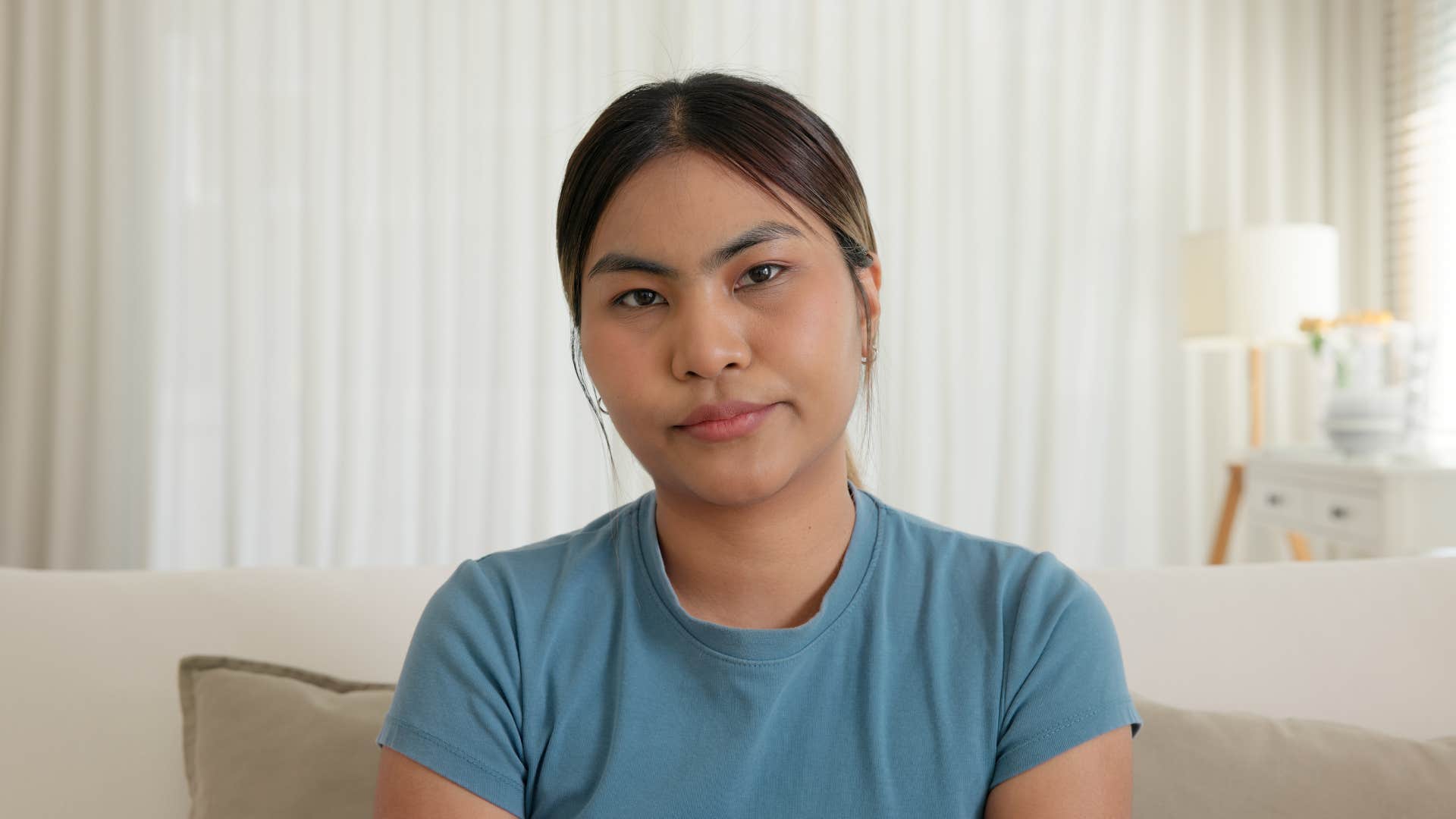 annoyed woman looking at camera