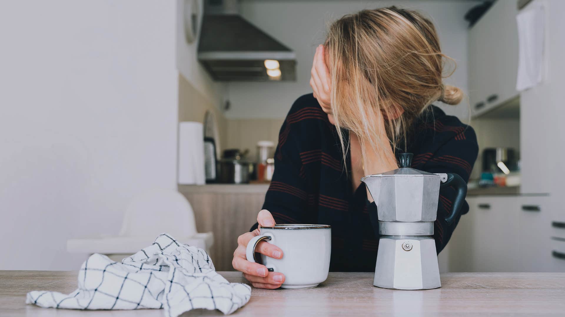 burned out woman drinking coffee