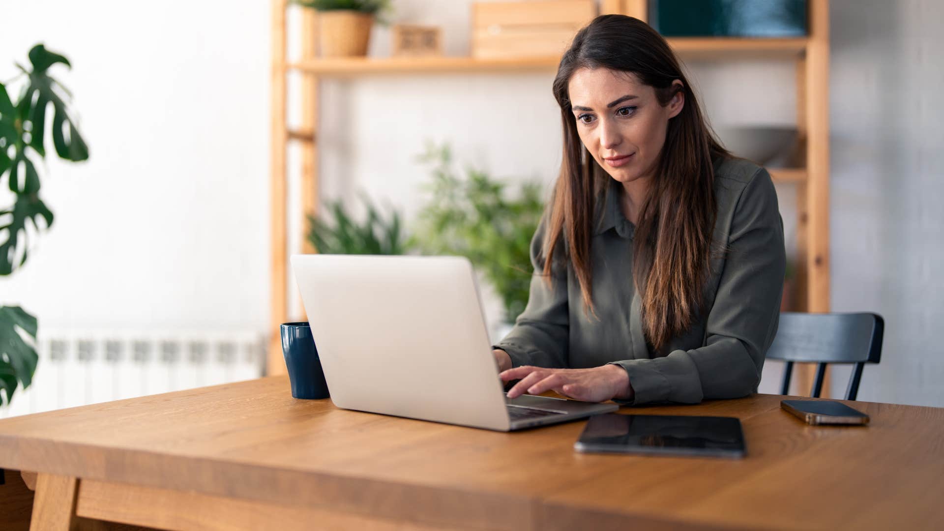 independent woman working from home