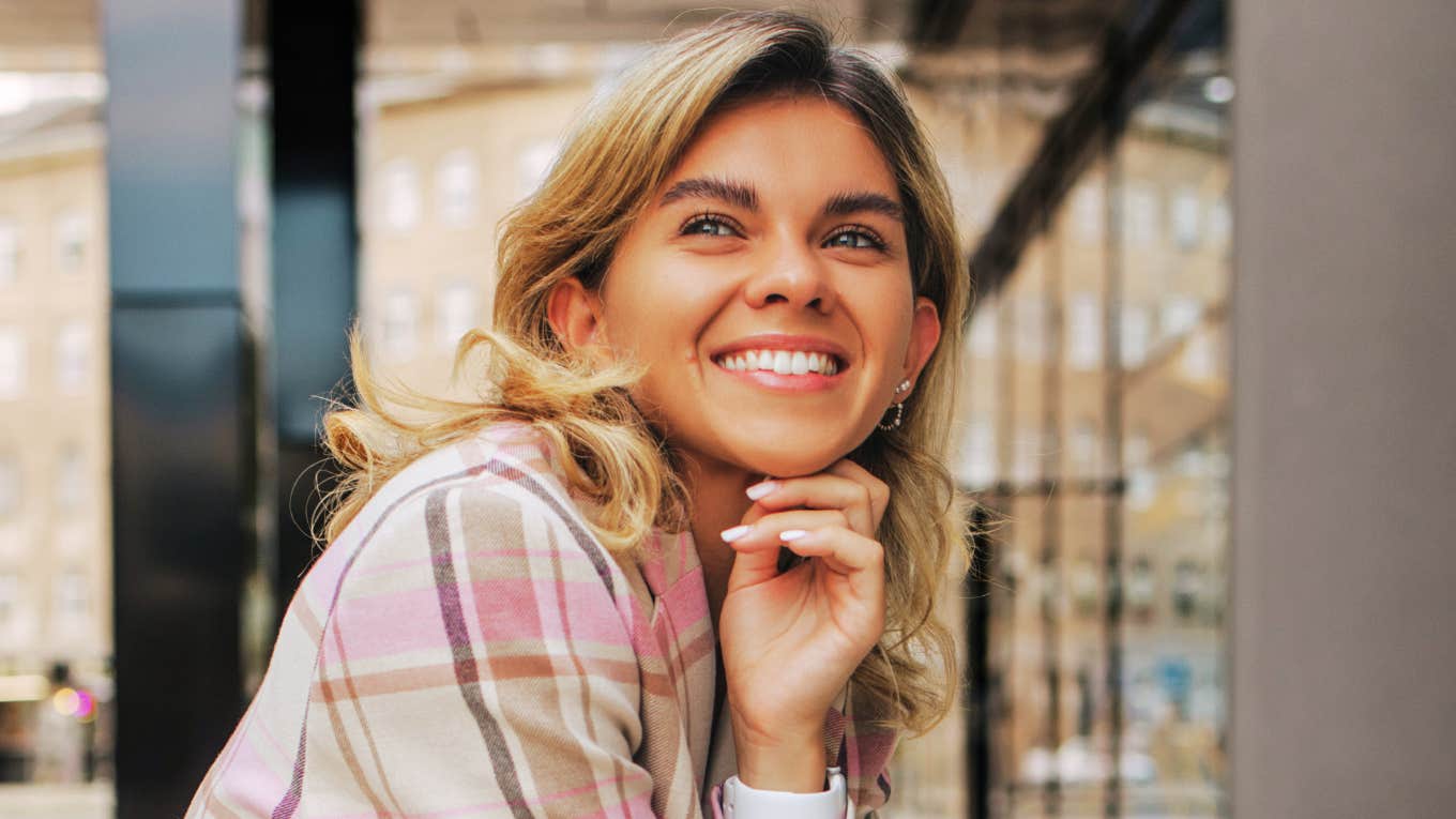 Confident woman demonstrating authentic independence, illustrating how women who crave real strength cultivate self-reliance and personal empowerment.