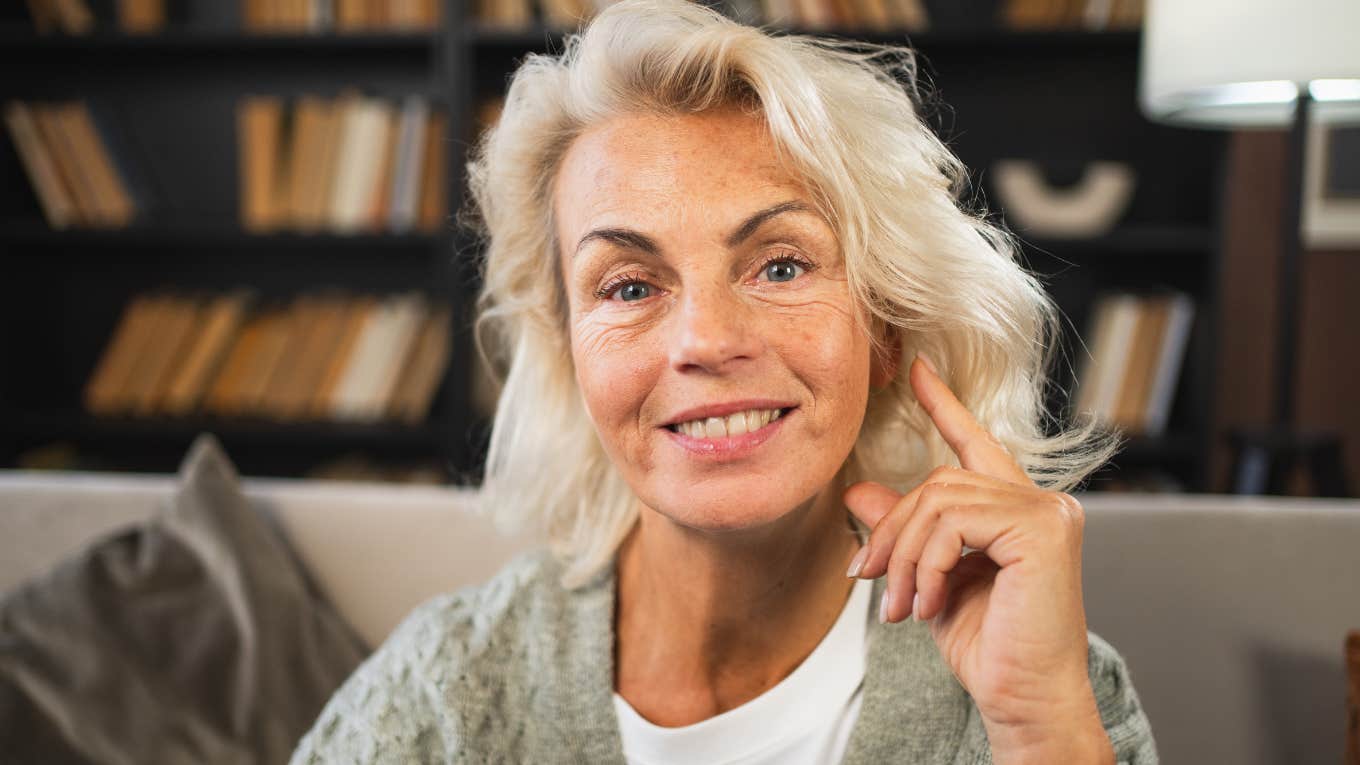 kind older woman smiling happily