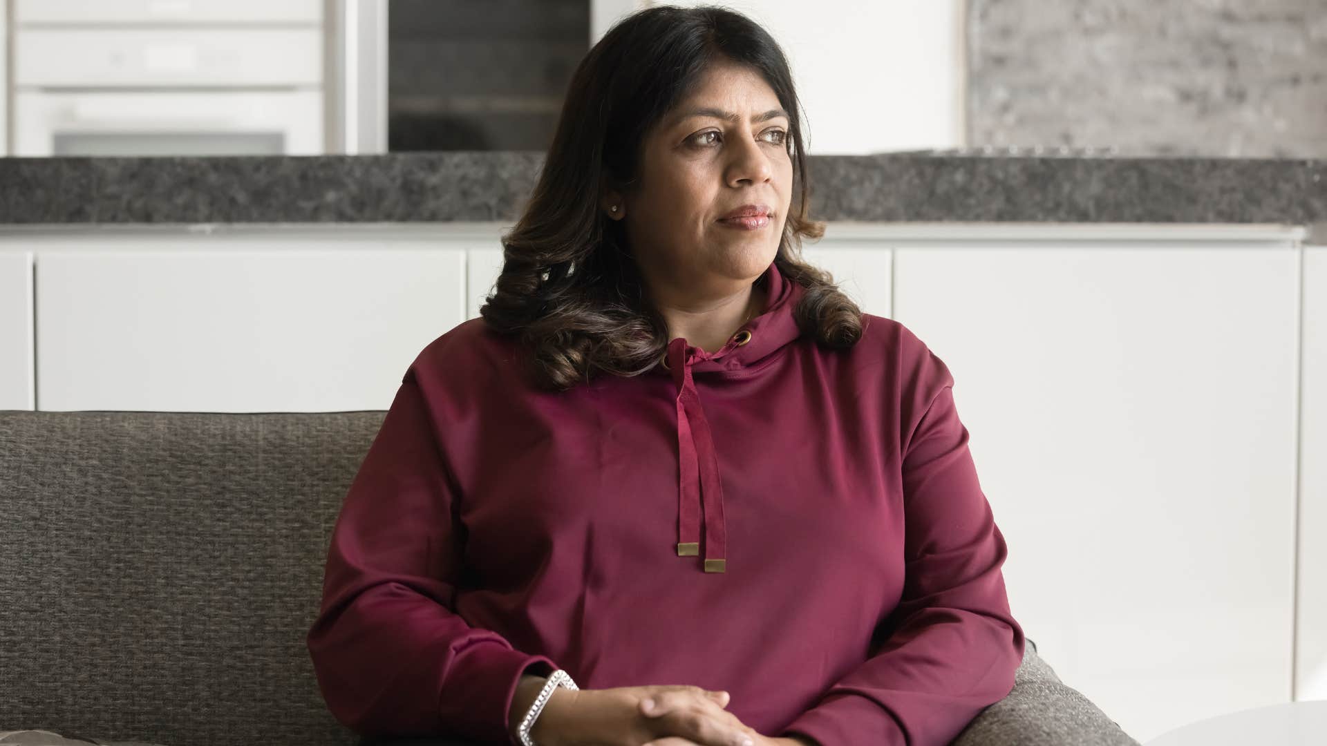 sad woman who's outgrowing people in her life