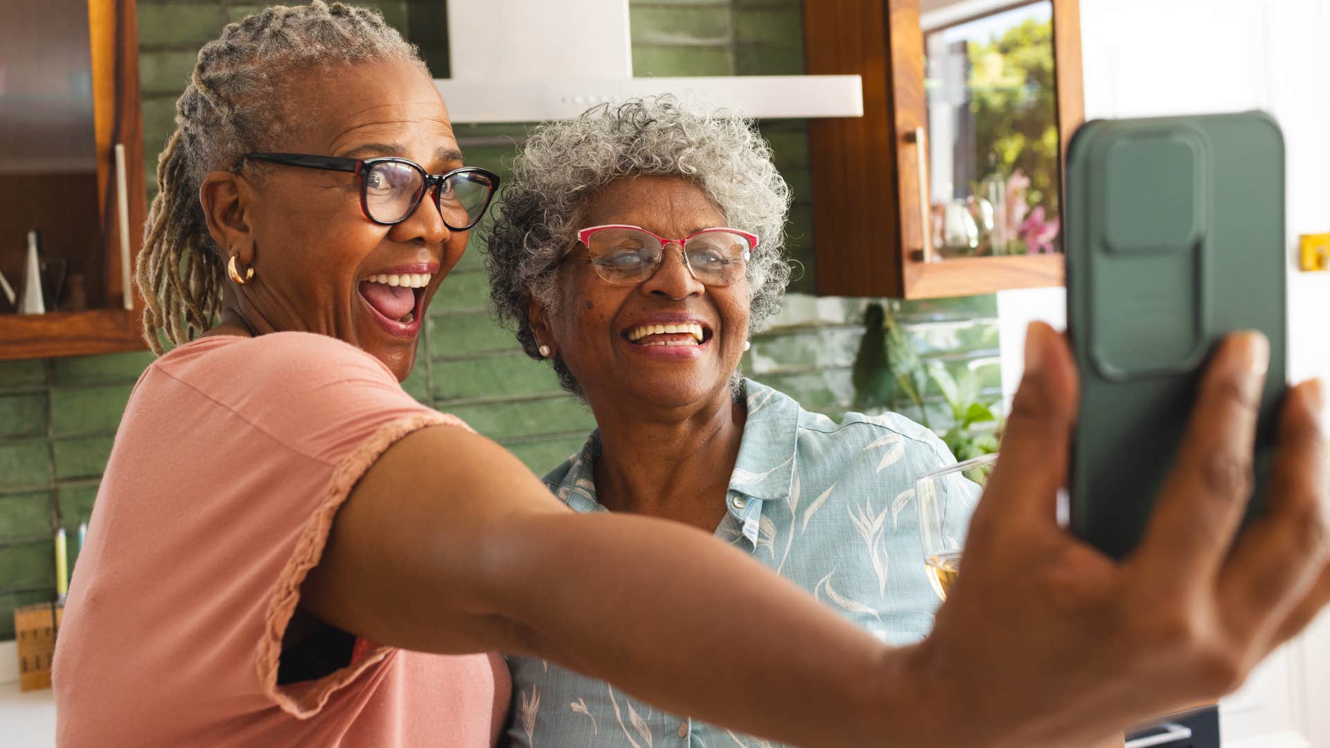 woman who's being pitted against other women smiling