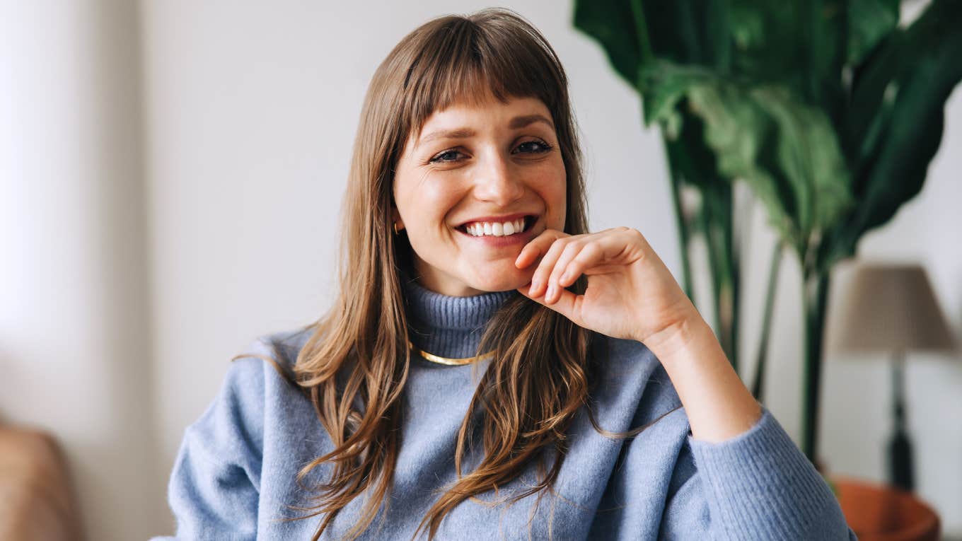 confident woman with high self-worth smiling