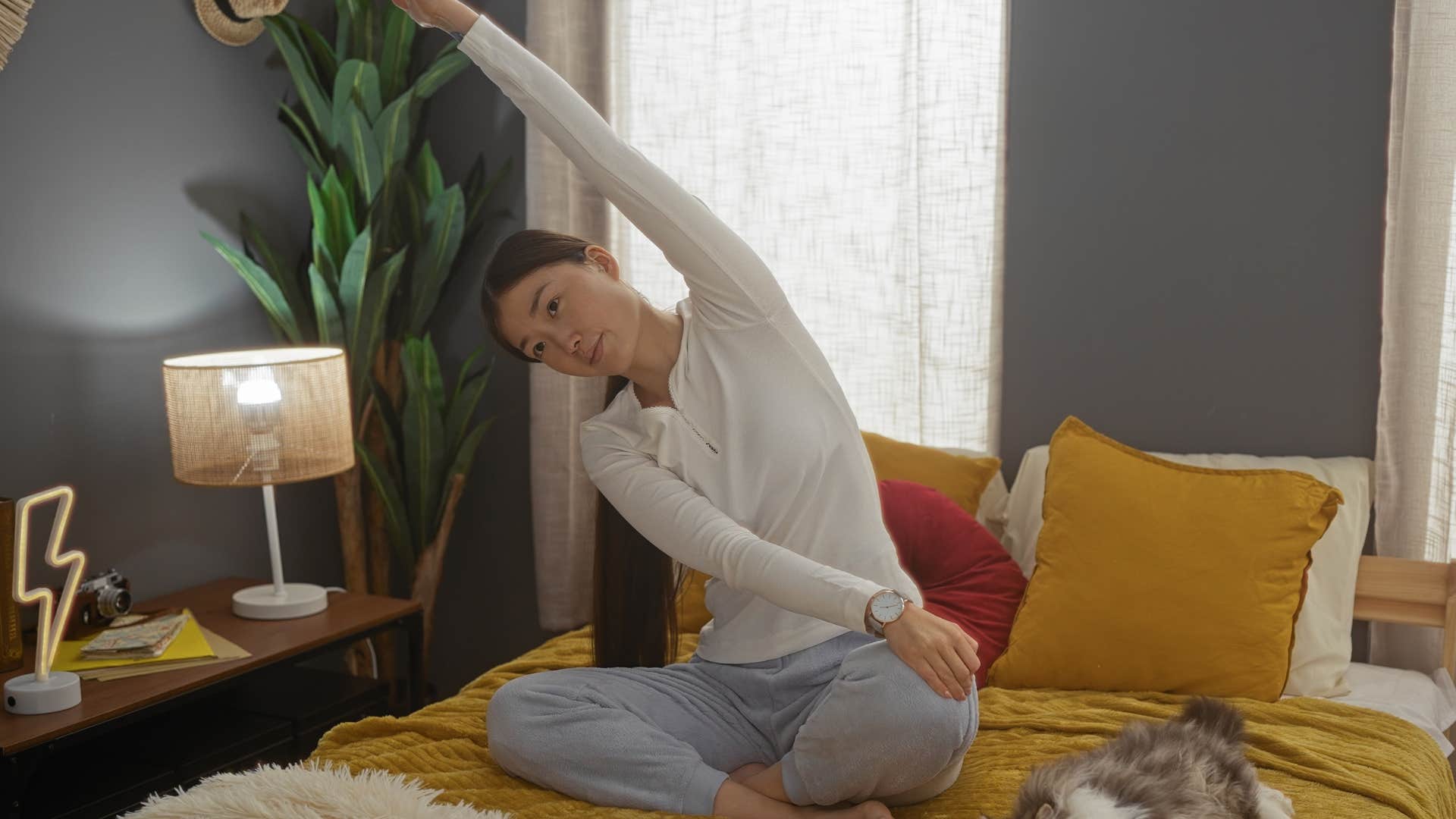 woman making for movement in her room before bedtime