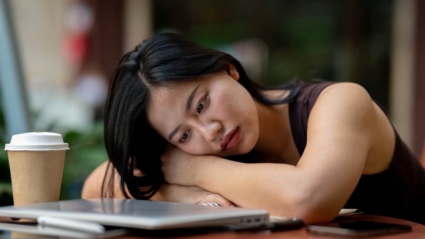 young woman with a lot weighing on her