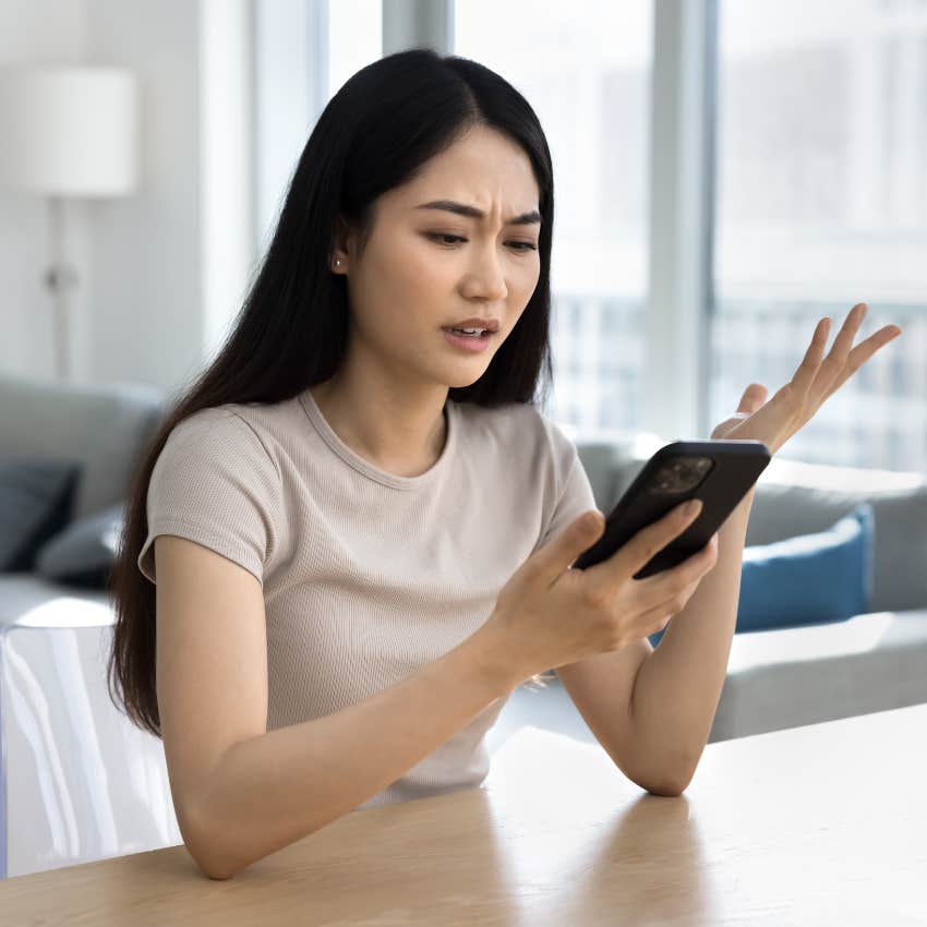 Young woman confused after she saw how low her credit score was
