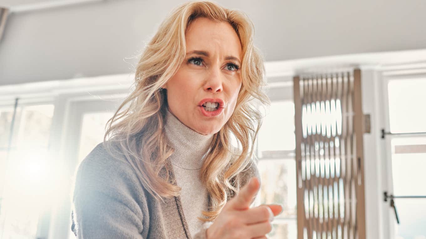 angry mother scolding her adult children