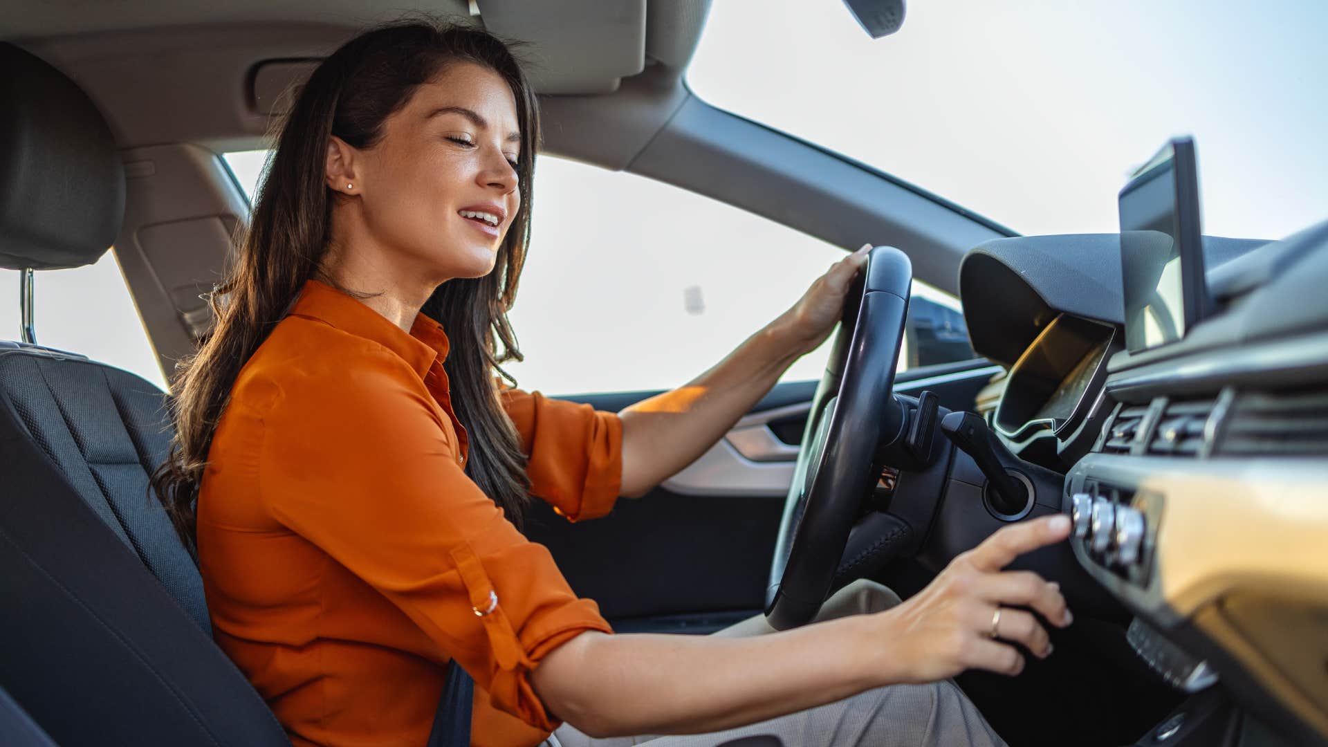 woman being mindful during her morning commute driving