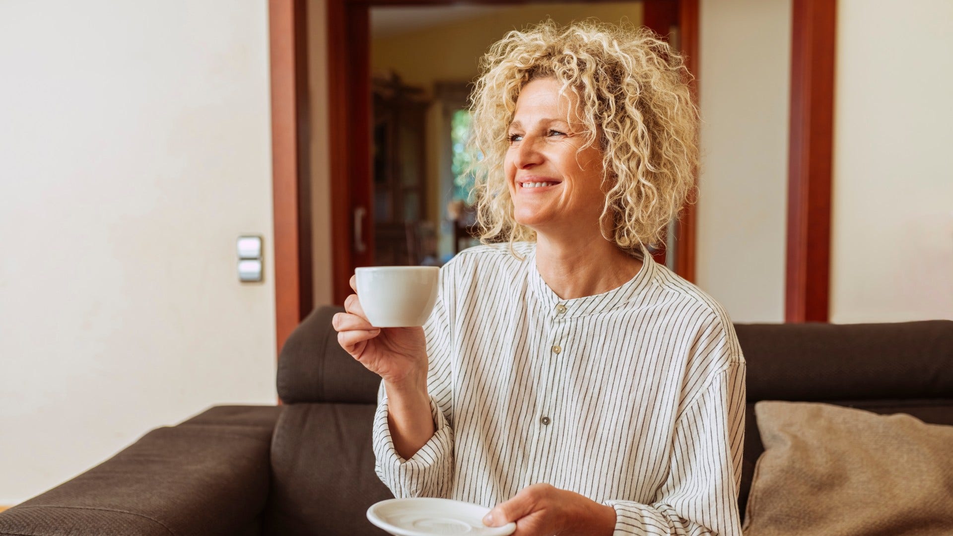 woman who is happy because she takes care of herself