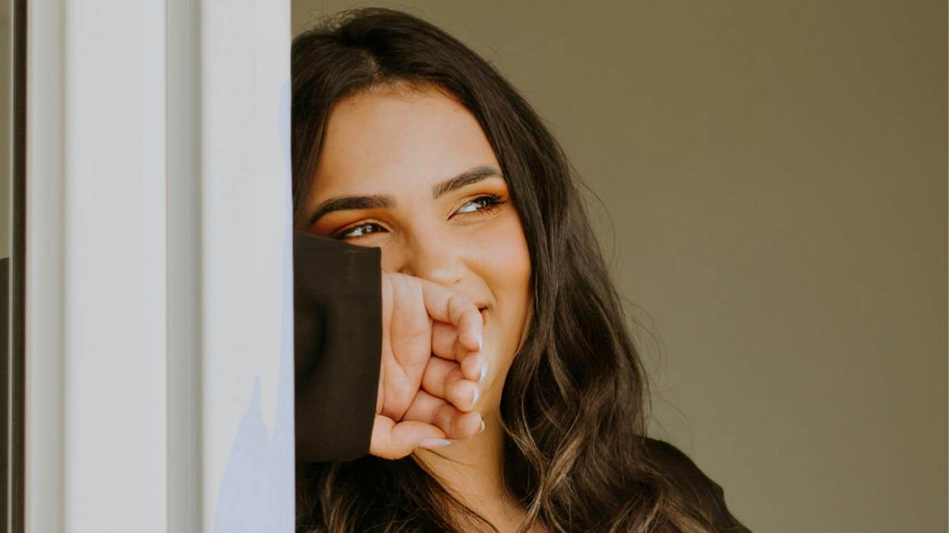 woman taking a calm grounding moment, illustrating the simple daily habits that help people stay unflappable and live a genuinely happy life