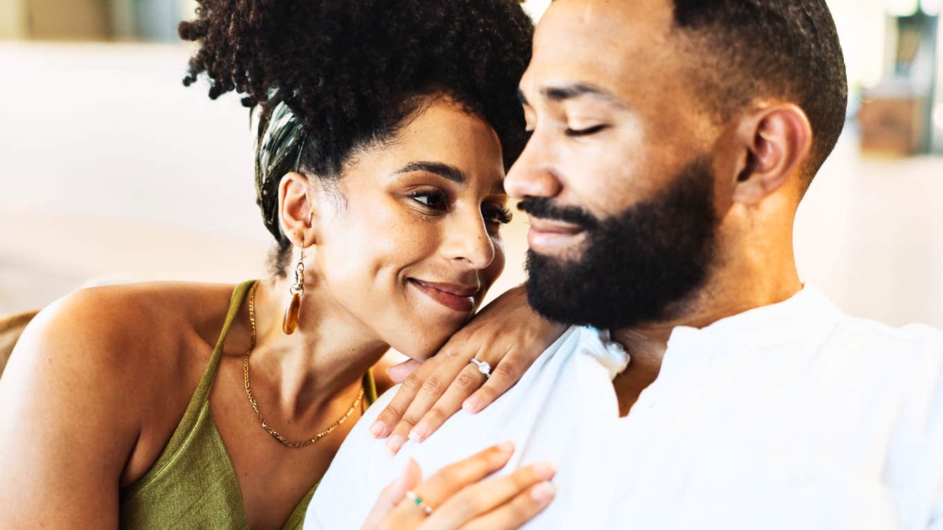 Married couple sharing a warm connected moment showing the art of us and the simple ways to have a happy marriage.