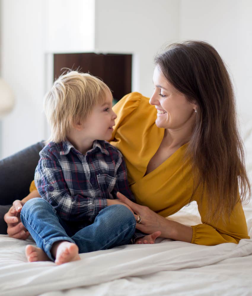 young boy staring at adult woman