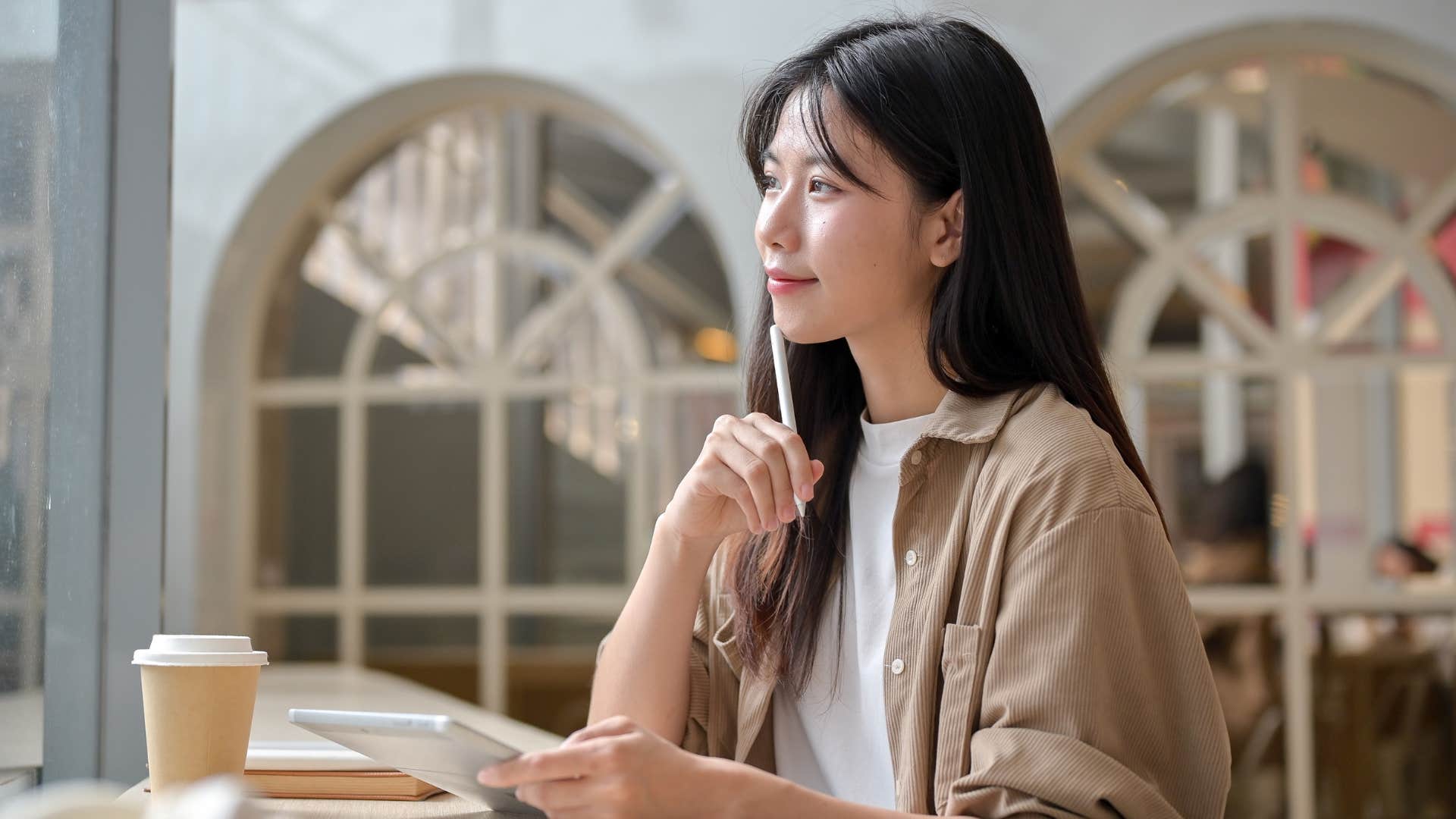 Imaginative person writes what ideas in notebook showing habit of visionaries