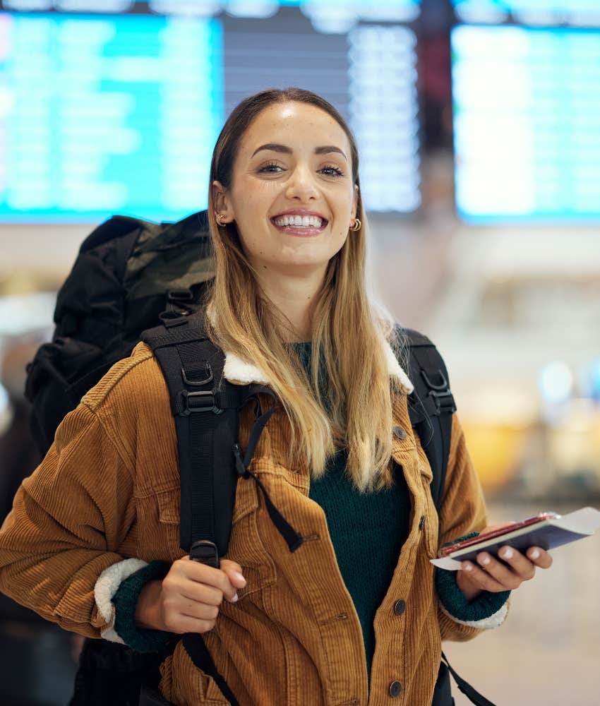 Enthusiastic person ready to travel showing choice happy people make