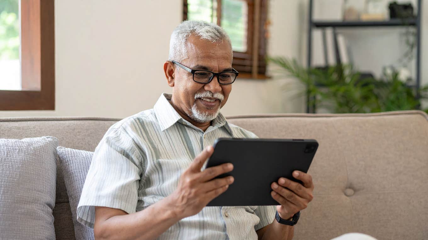 elderly man on tablet