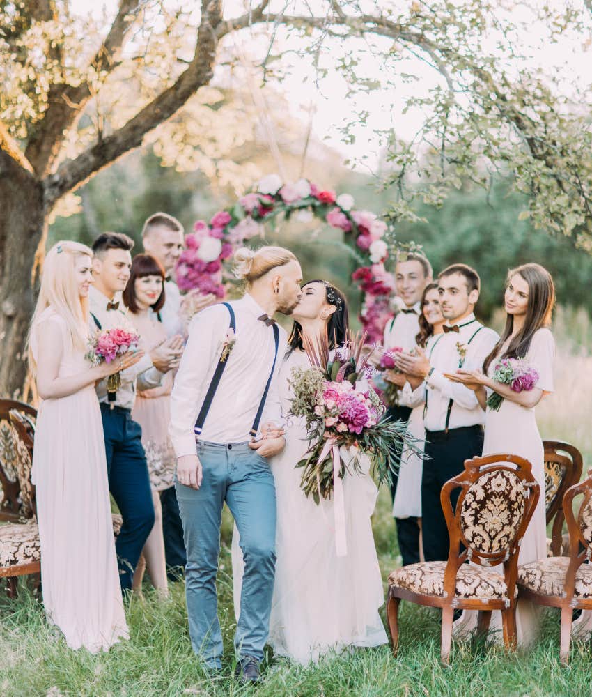 Happy wedding at small outdoor venue showing big fun day