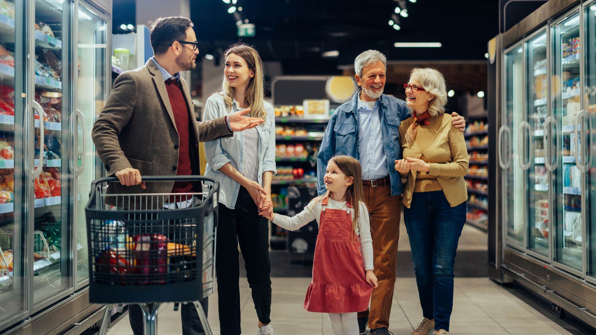 family shopping at grocery store together
