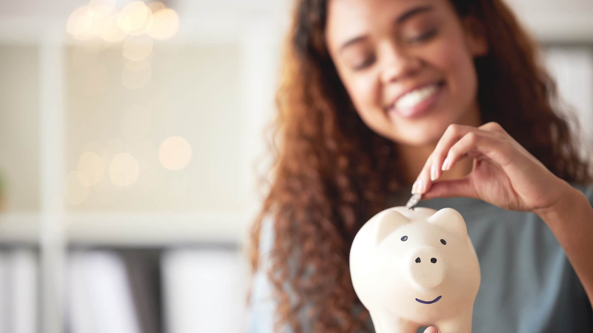 money conscious woman saving coins