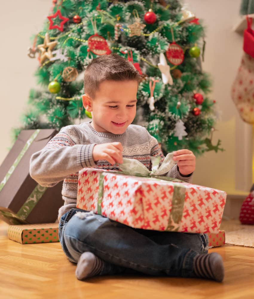 boy opening christmas present