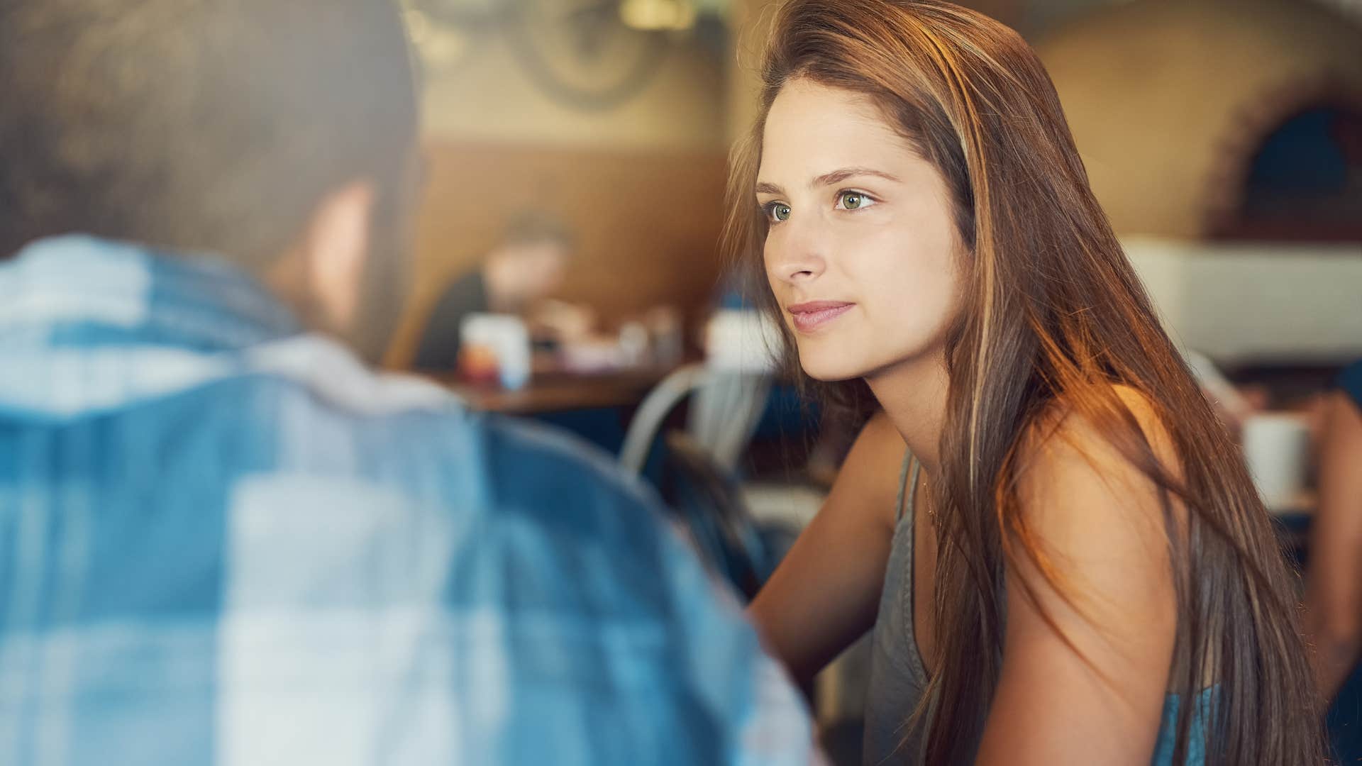 woman listening to man talk